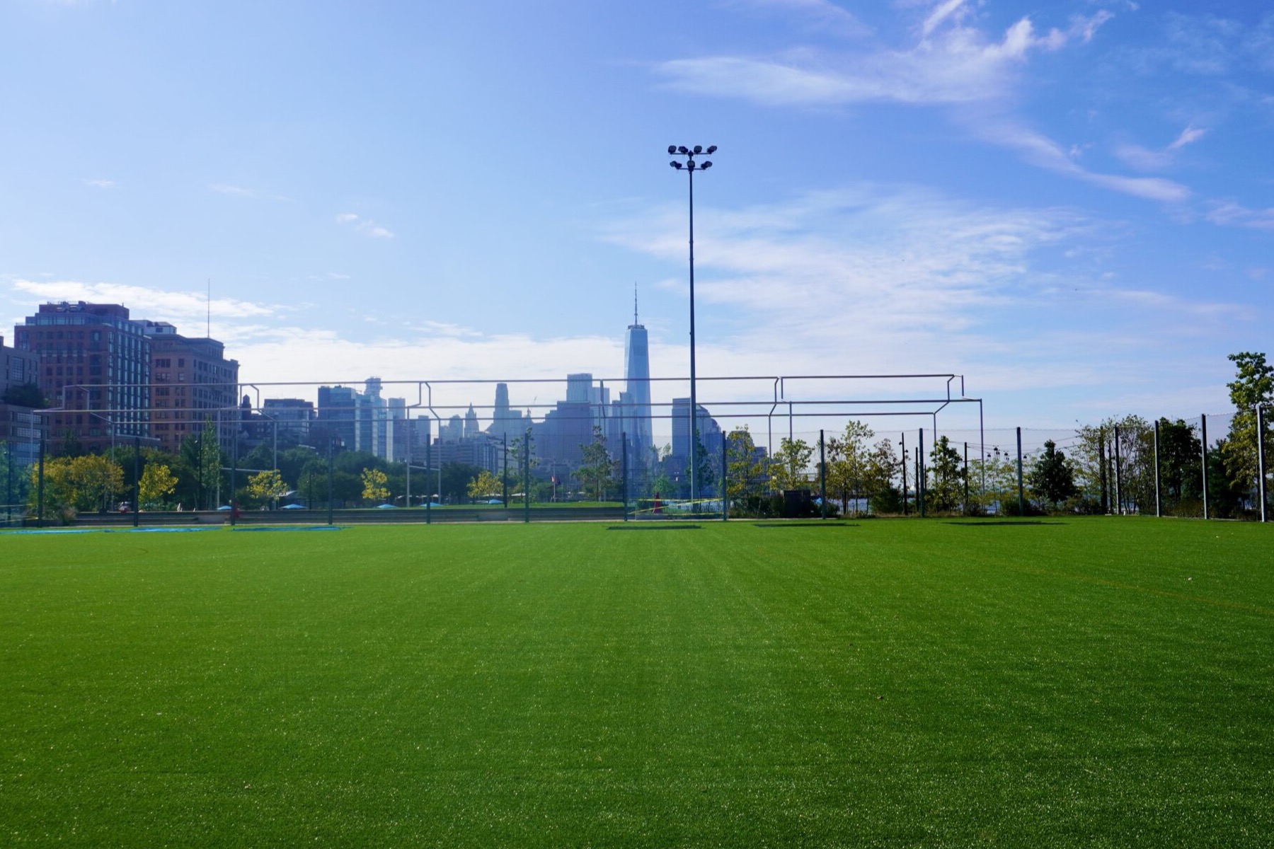 Gansevoort Peninsula turf field and skyline
